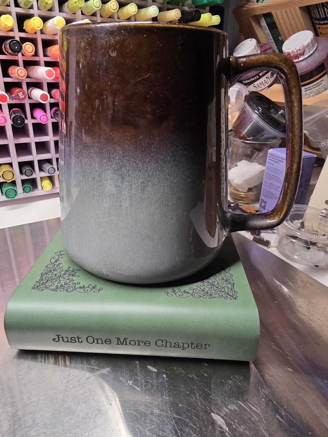 Mug sitting on a book-shaped coaster set