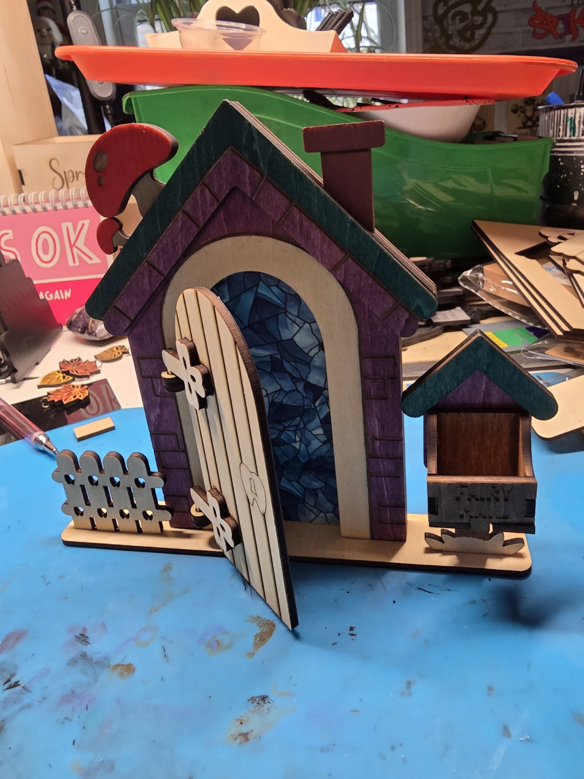 Decorative layered wooden birdhouse