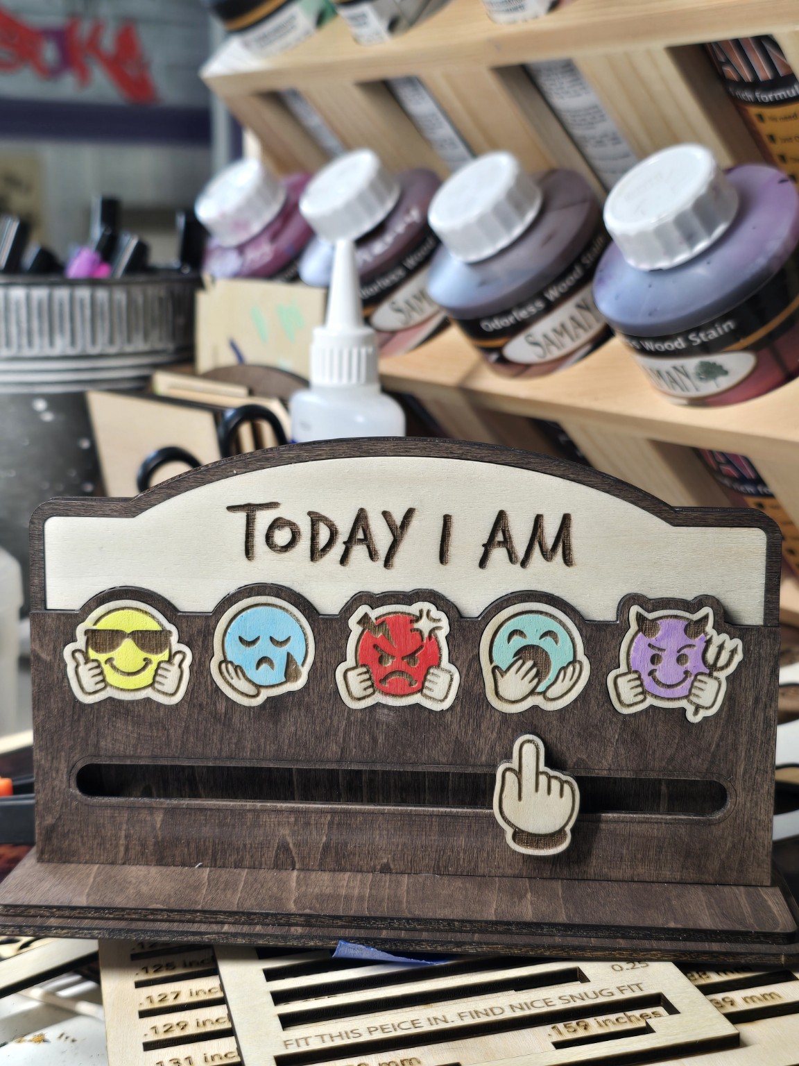 Handmade mood slider with colorful expressive faces
