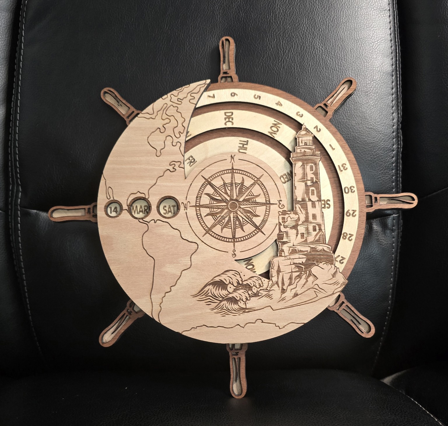 Nautical compass artwork on a round wooden piece